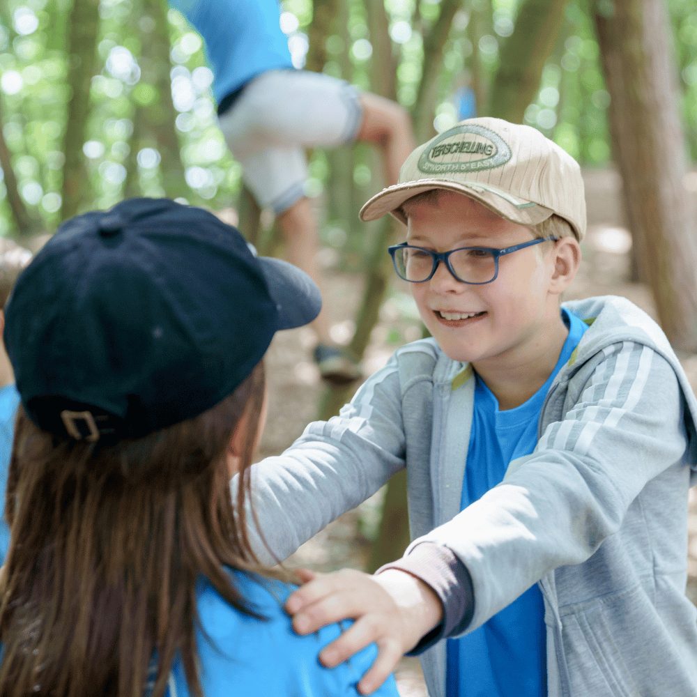 Waarom broers en zussen beter opschieten na zomerkamp